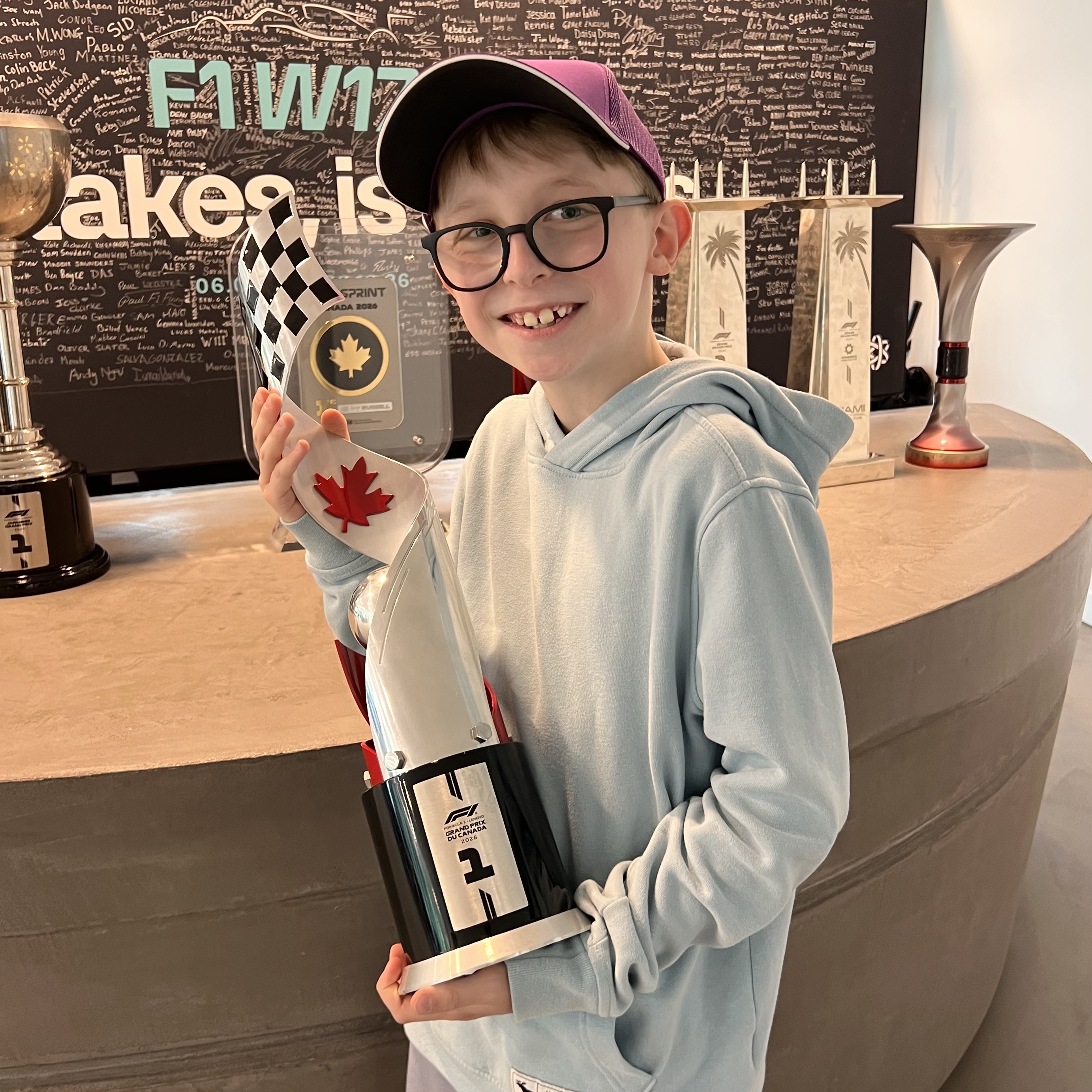 Ethan holding the same Canadian Grand Prix trophy
